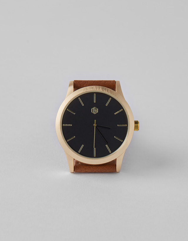 Uhr mit Armband aus Kunstleder