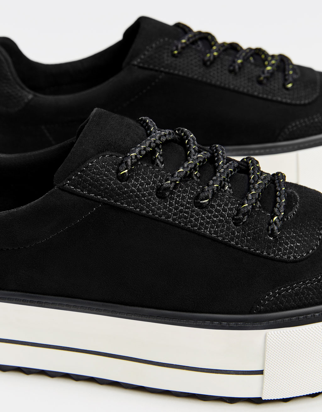 black platform trainers