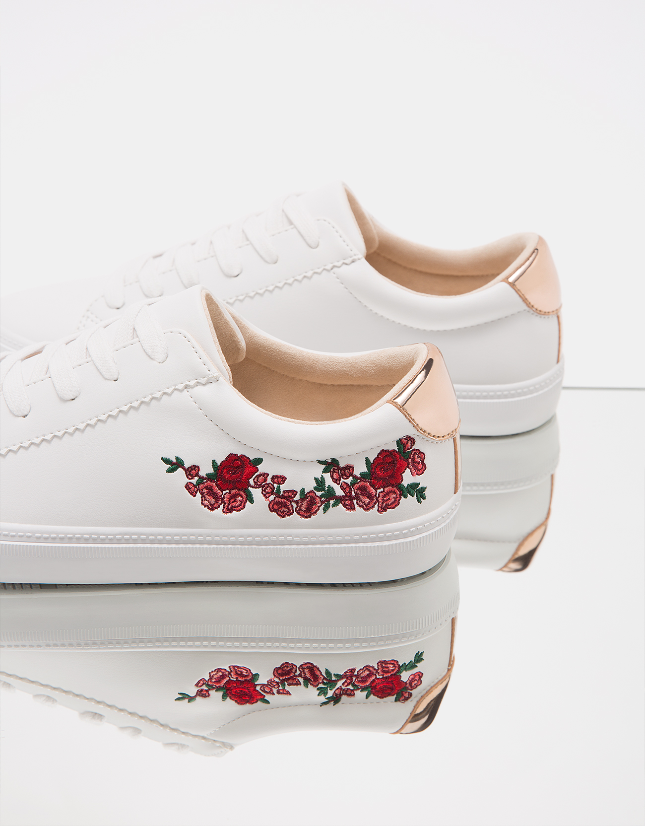 white sneakers with floral embroidery