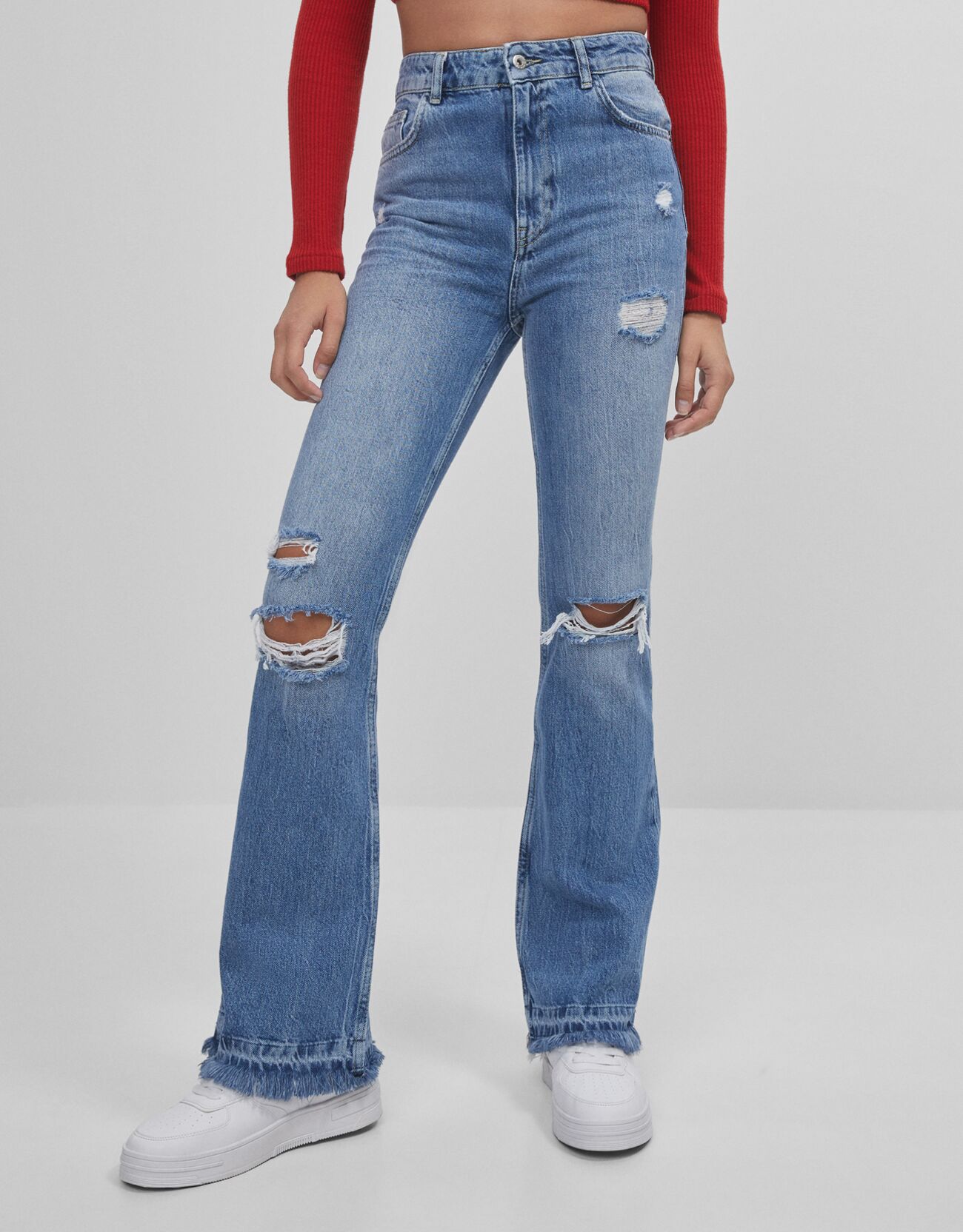 flare jeans with rips