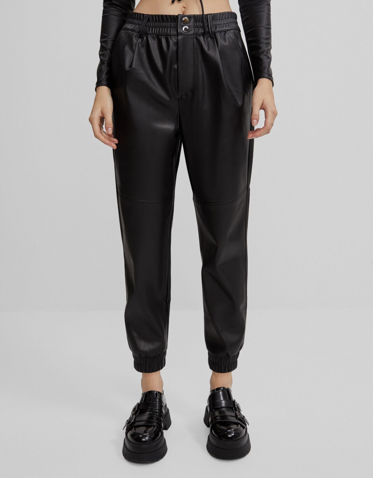 faux leather jogger trousers