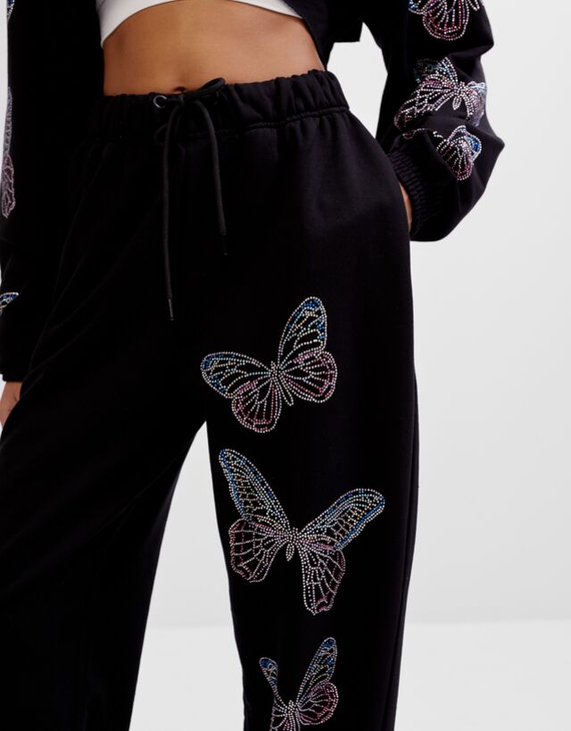 joggers with butterflies