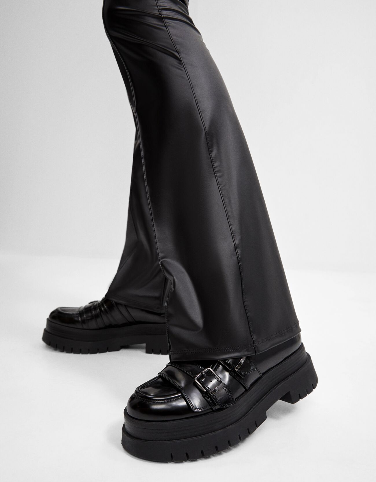 Faux leather flared trousers - CLOTHING 