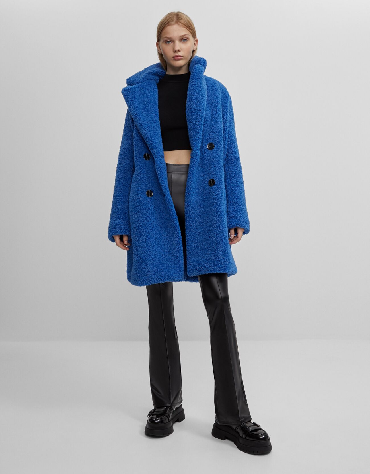 Faux leather flared trousers - CLOTHING 