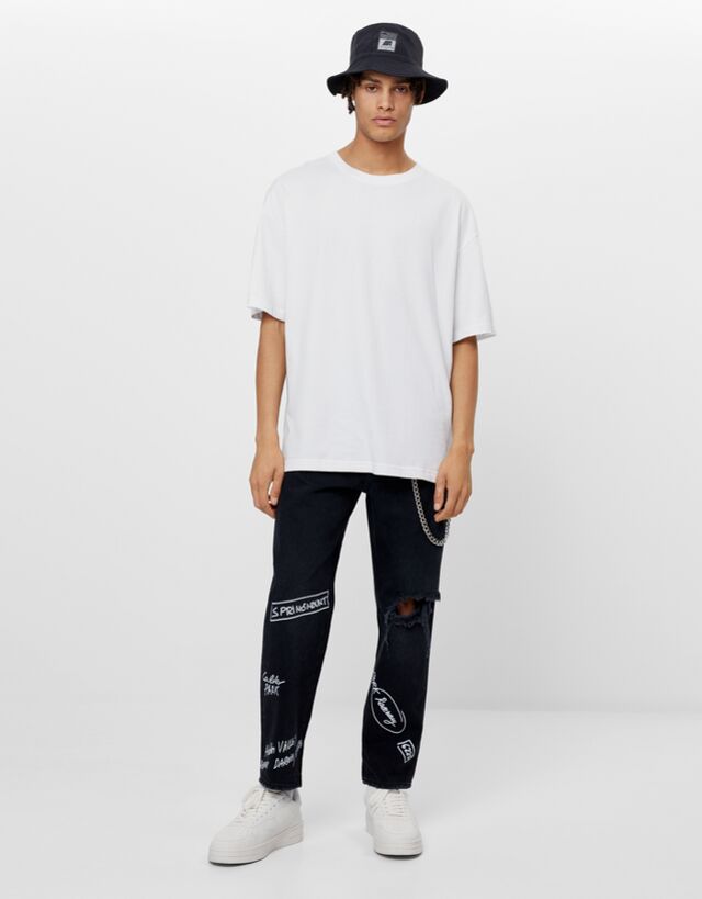 Graffiti straight fit jeans with rips - Jeans - Woman | Bershka