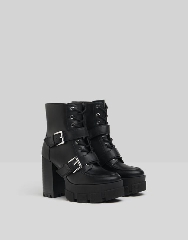 black platform boots buckles