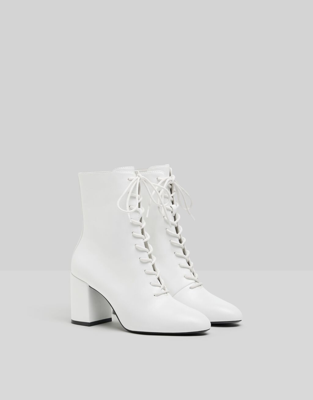 bershka lace up heeled boot in white