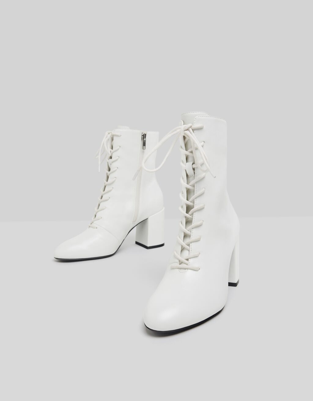 bershka lace up heeled boot in white