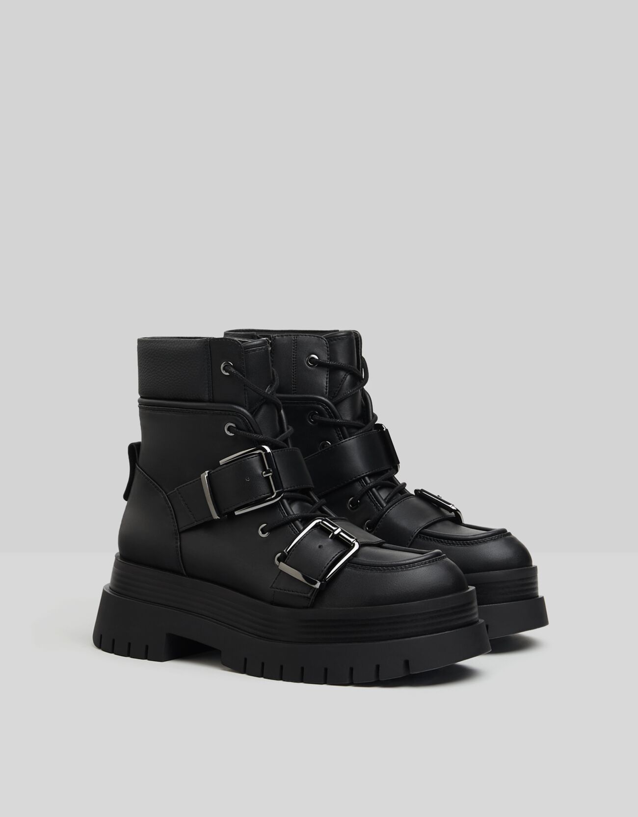buckle wedge boots