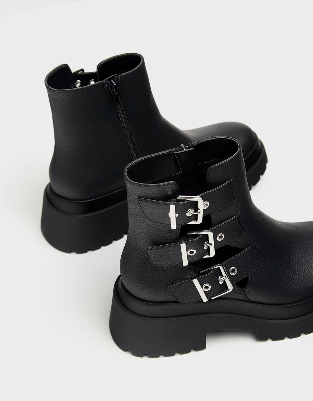 flat black ankle boots with buckles