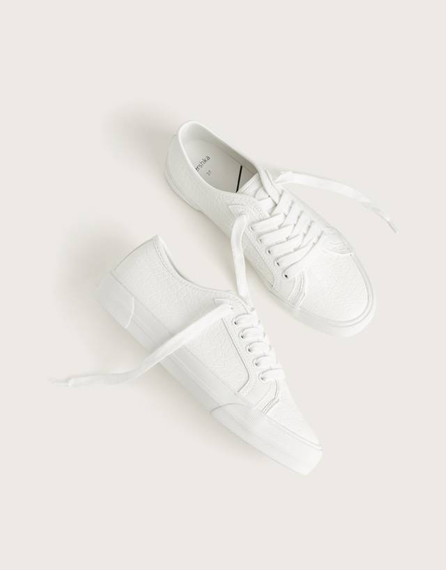white trainers with leopard print