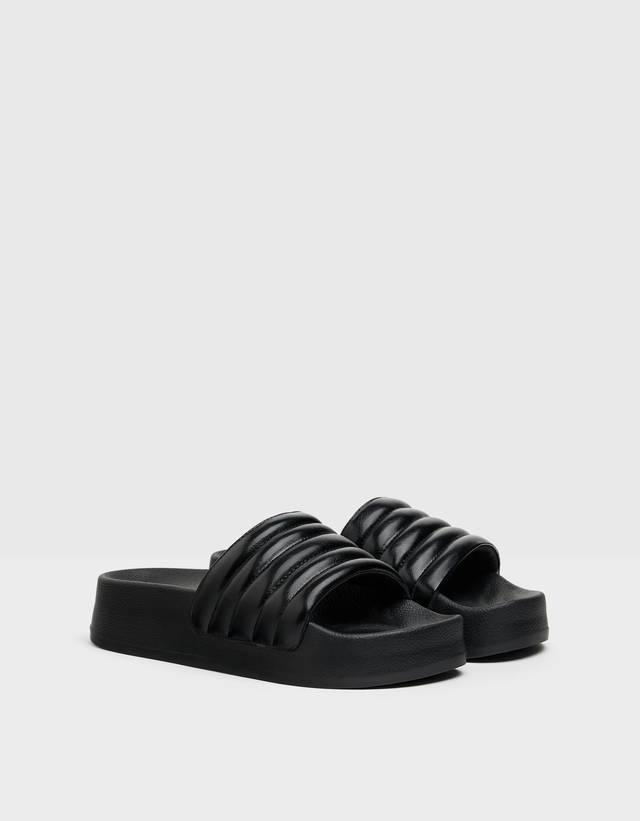 white quilted platform sandals