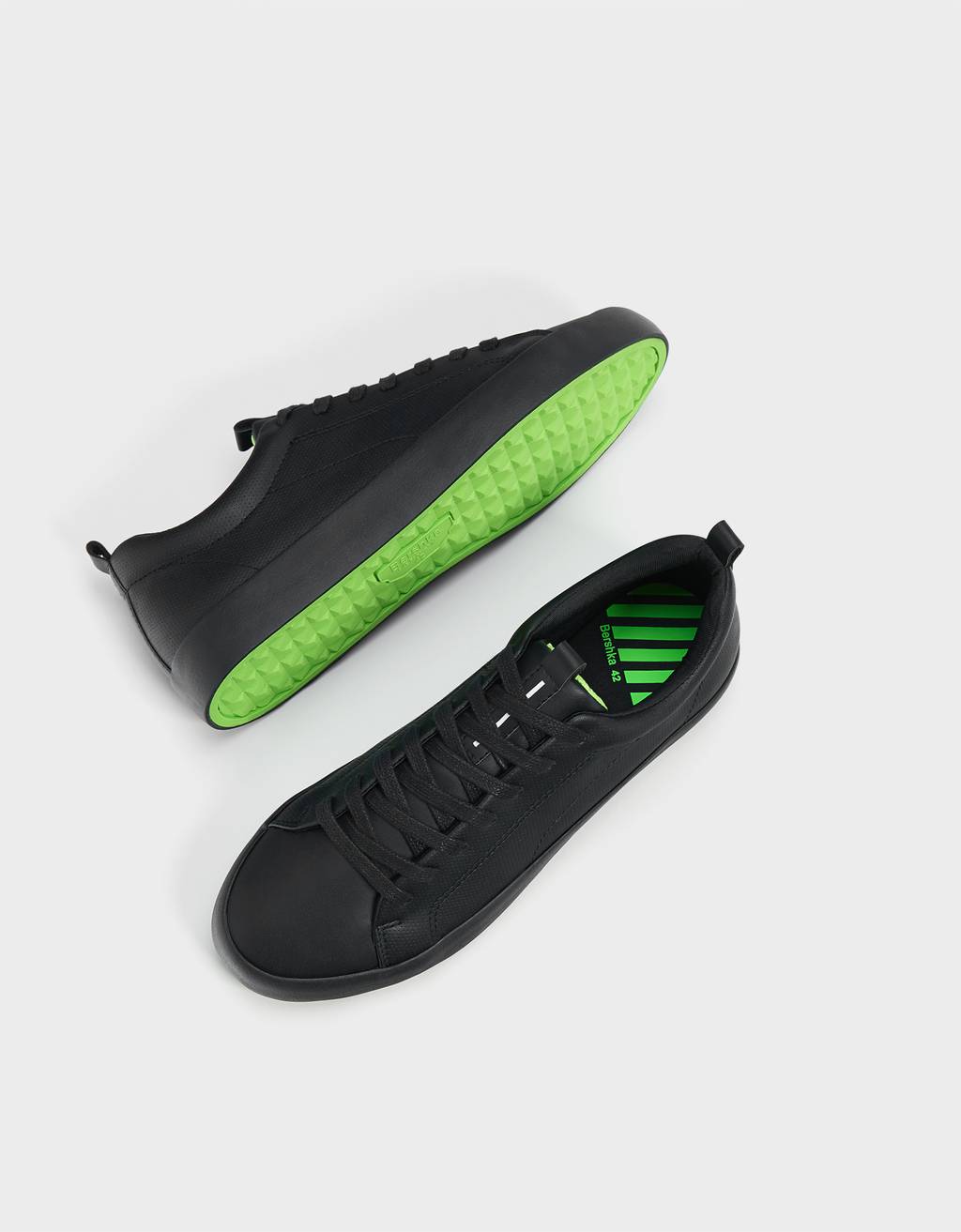 black and neon trainers