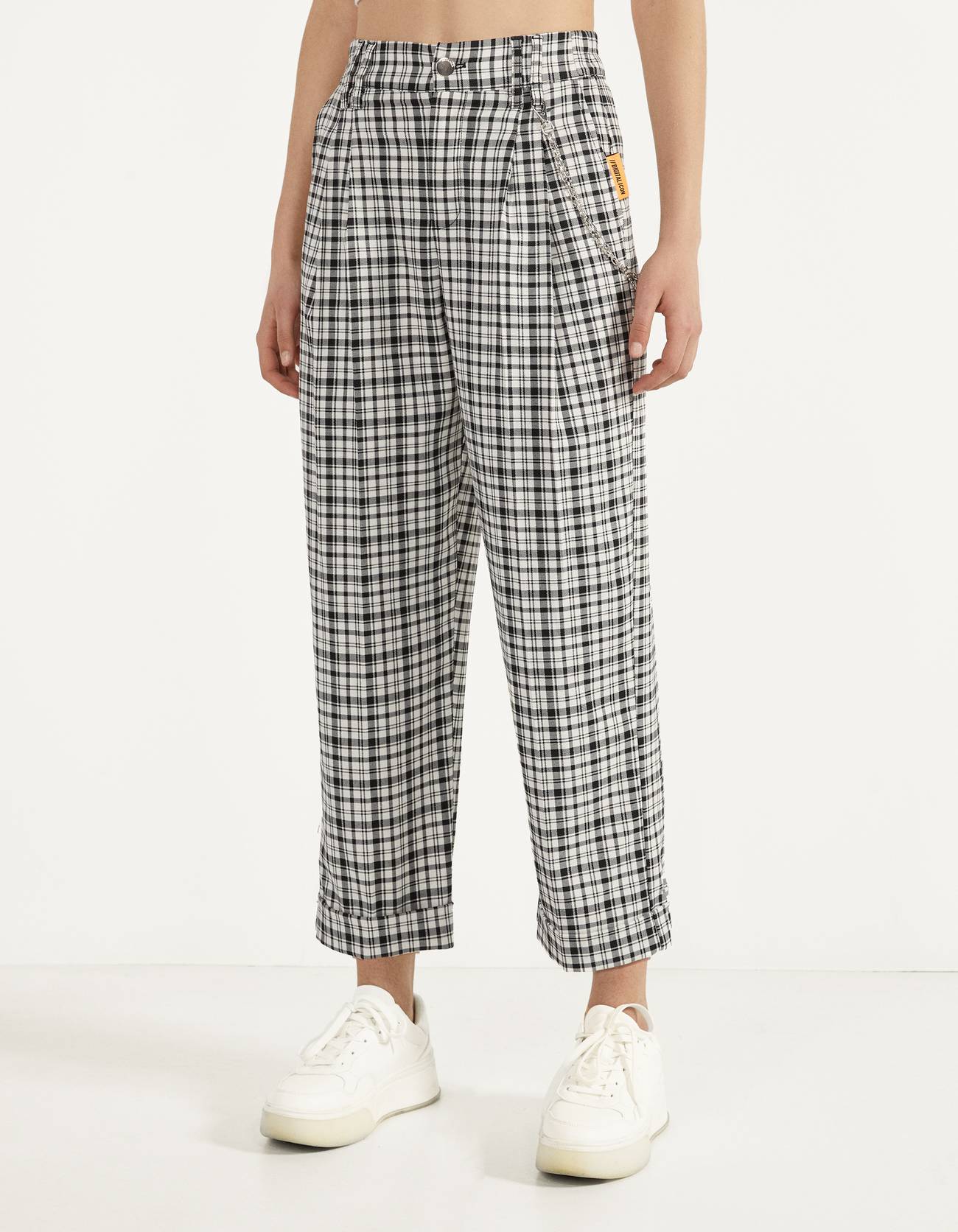 Checked trousers with chain detail 