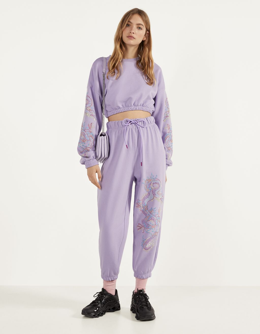 Jogging trousers with shiny dragon 