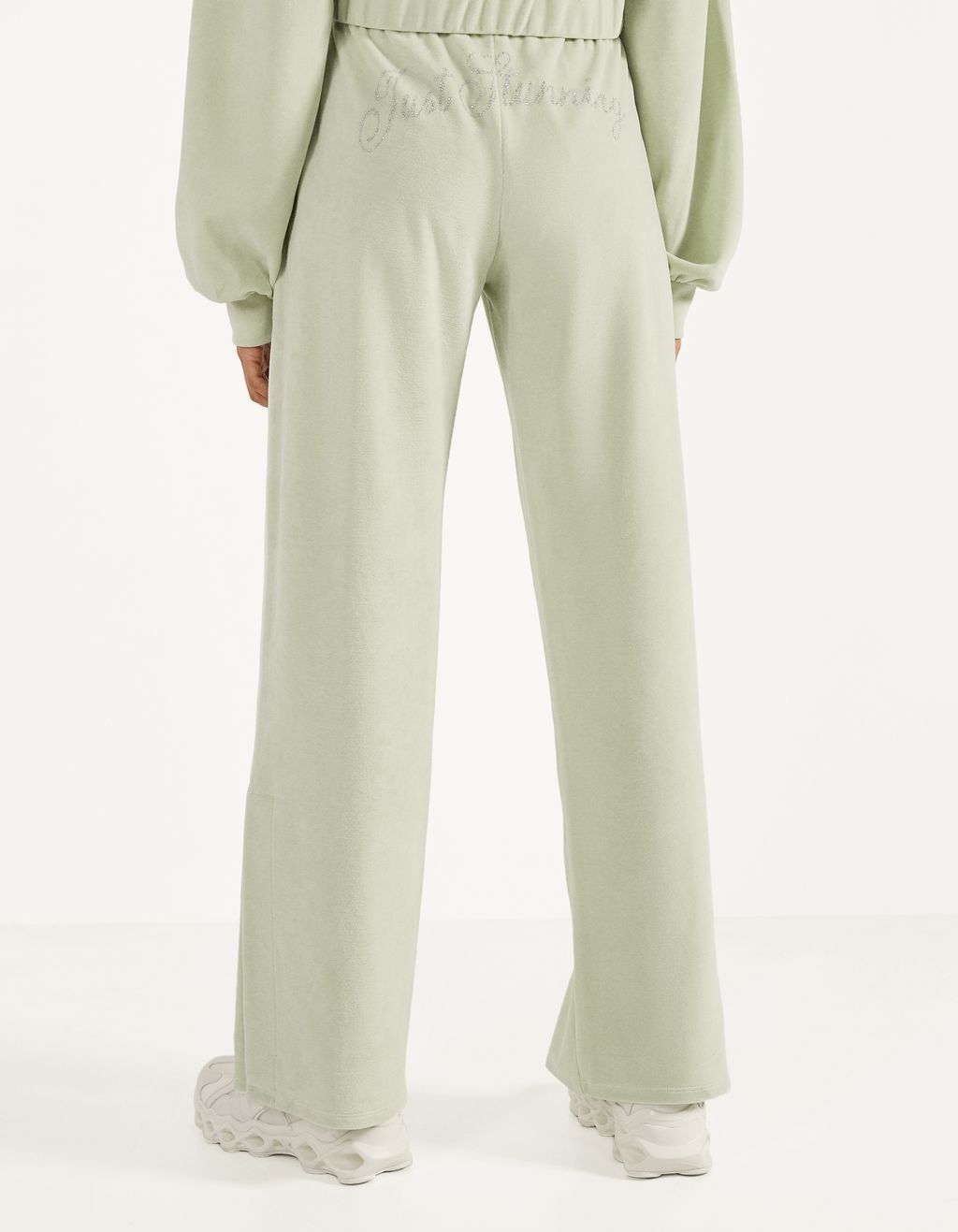 Velvet trousers with shiny details 