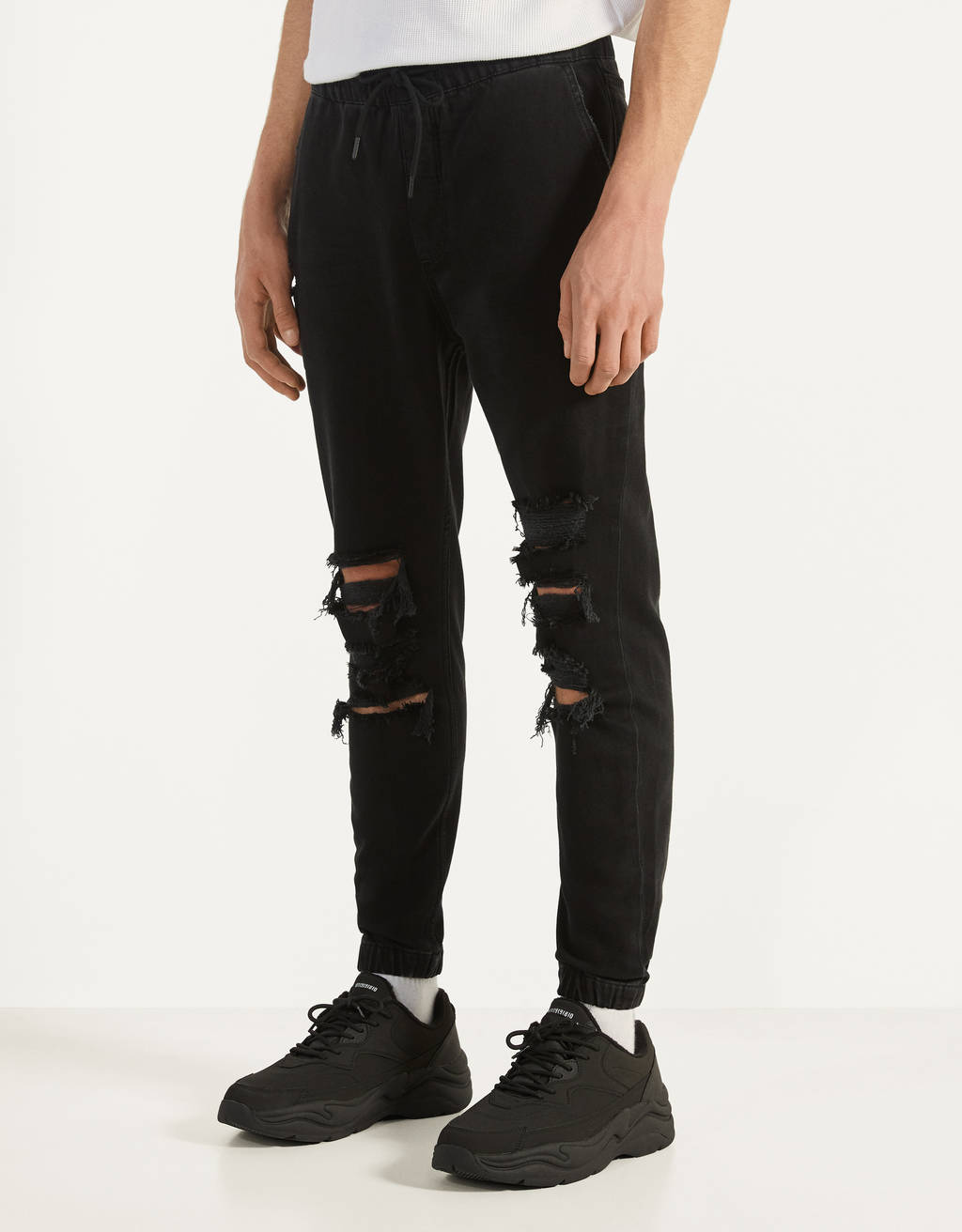 black ripped jogger jeans