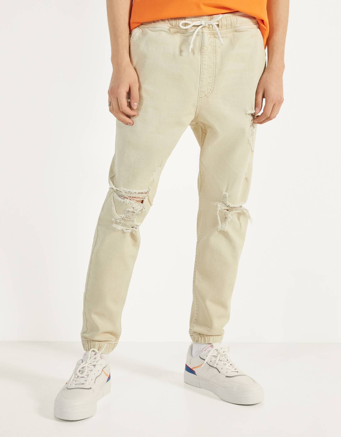 torn jogger jeans