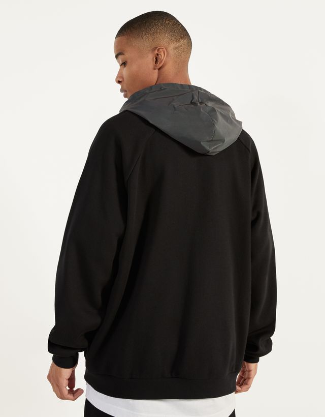 Sudadera reflectante con capucha - Mujer | Bershka