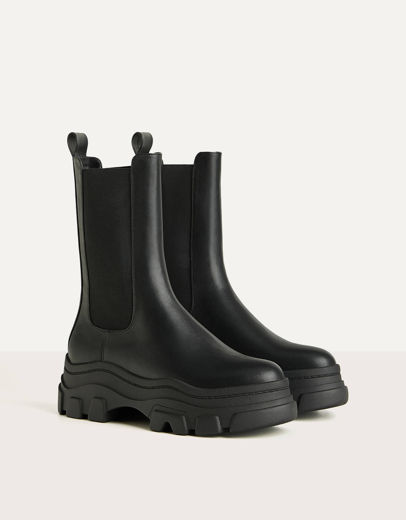Stretch platform ankle boots with track
