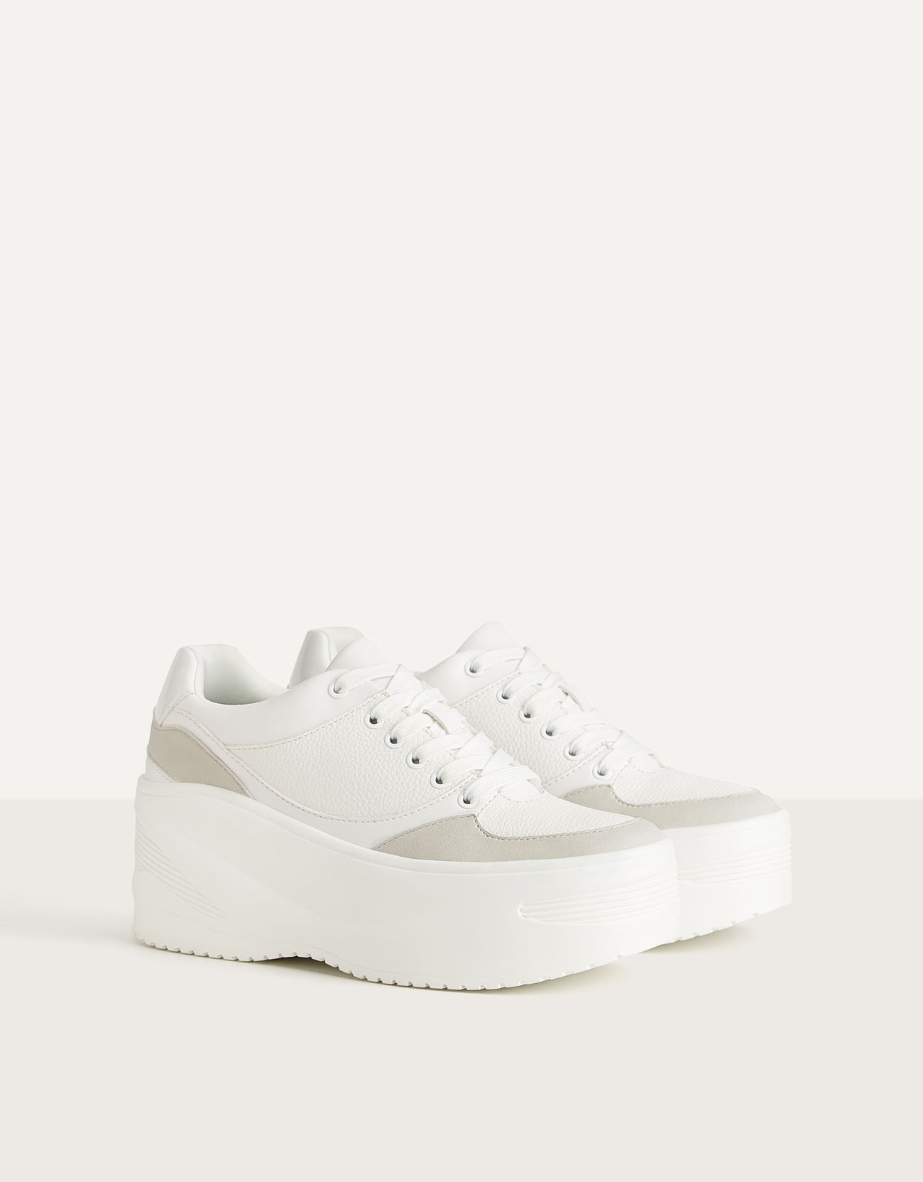 all white platform trainers