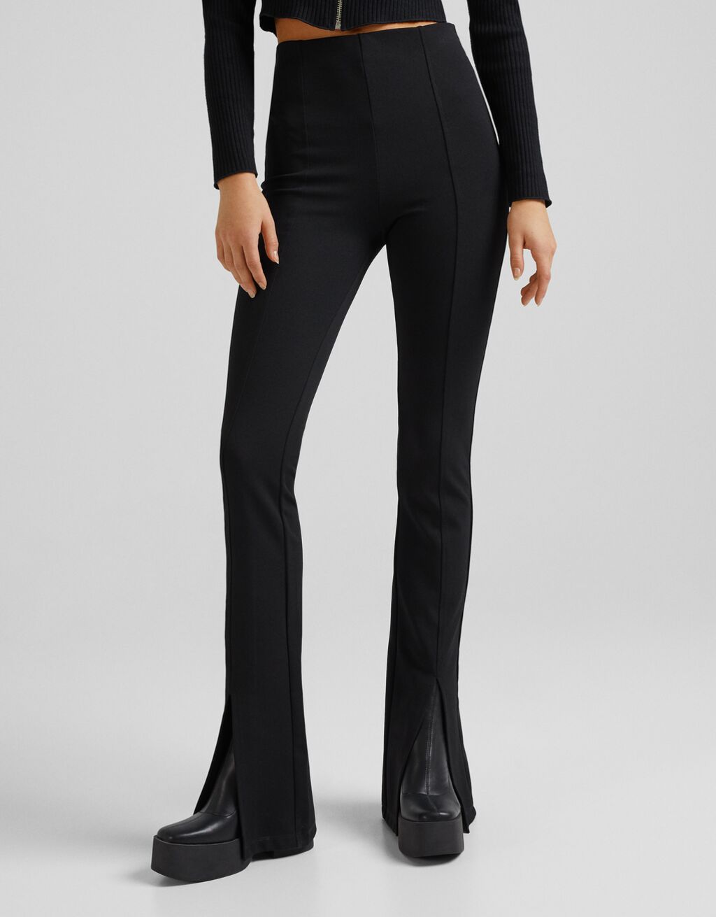 Flare trousers with split hems