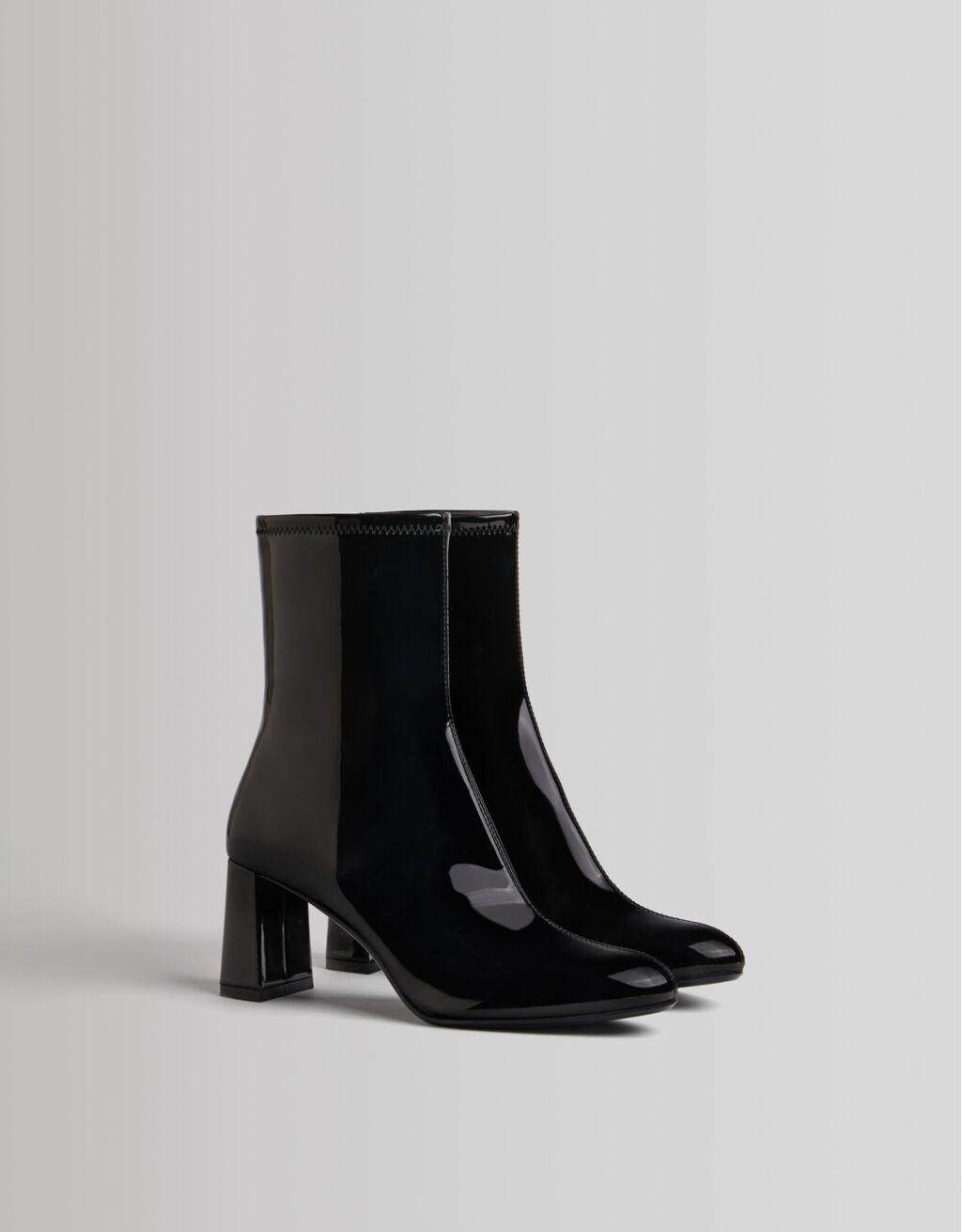 Heeled faux patent fitted ankle boots