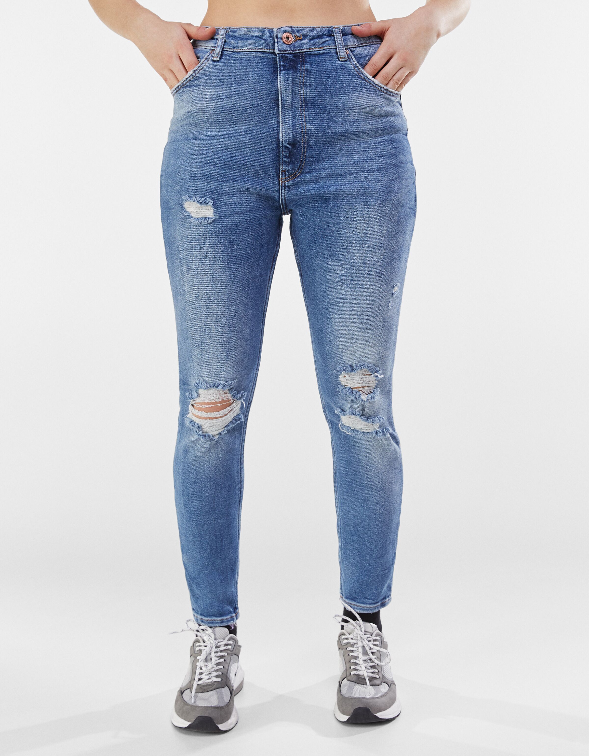 blue skinny high waisted ripped jeans