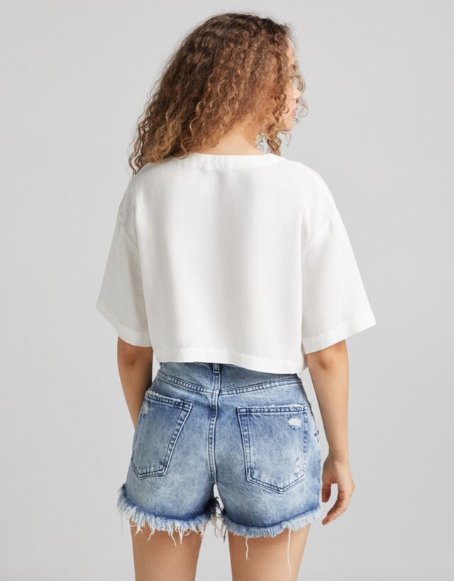 Ripped denim shorts - Denim - Woman 