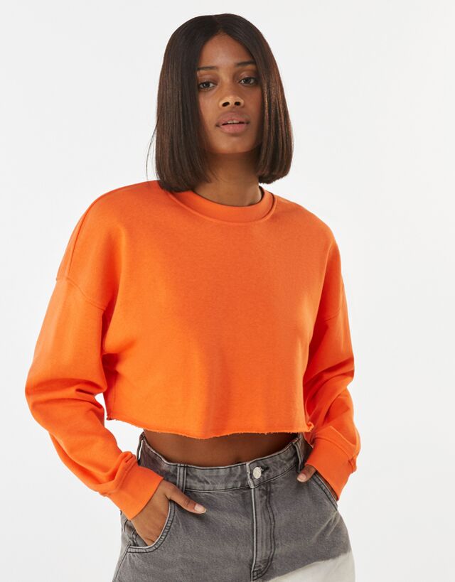 cropped orange sweatshirt