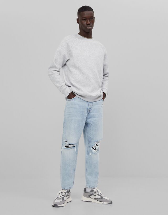 Loose fit jeans with rips - Jeans - Man 