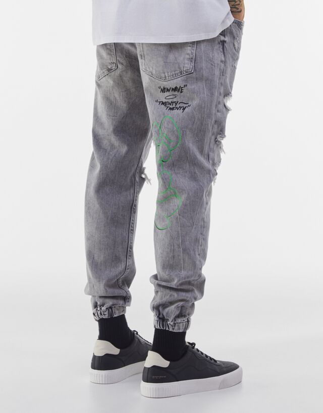 Ripped printed jogger jeans - Man | Bershka