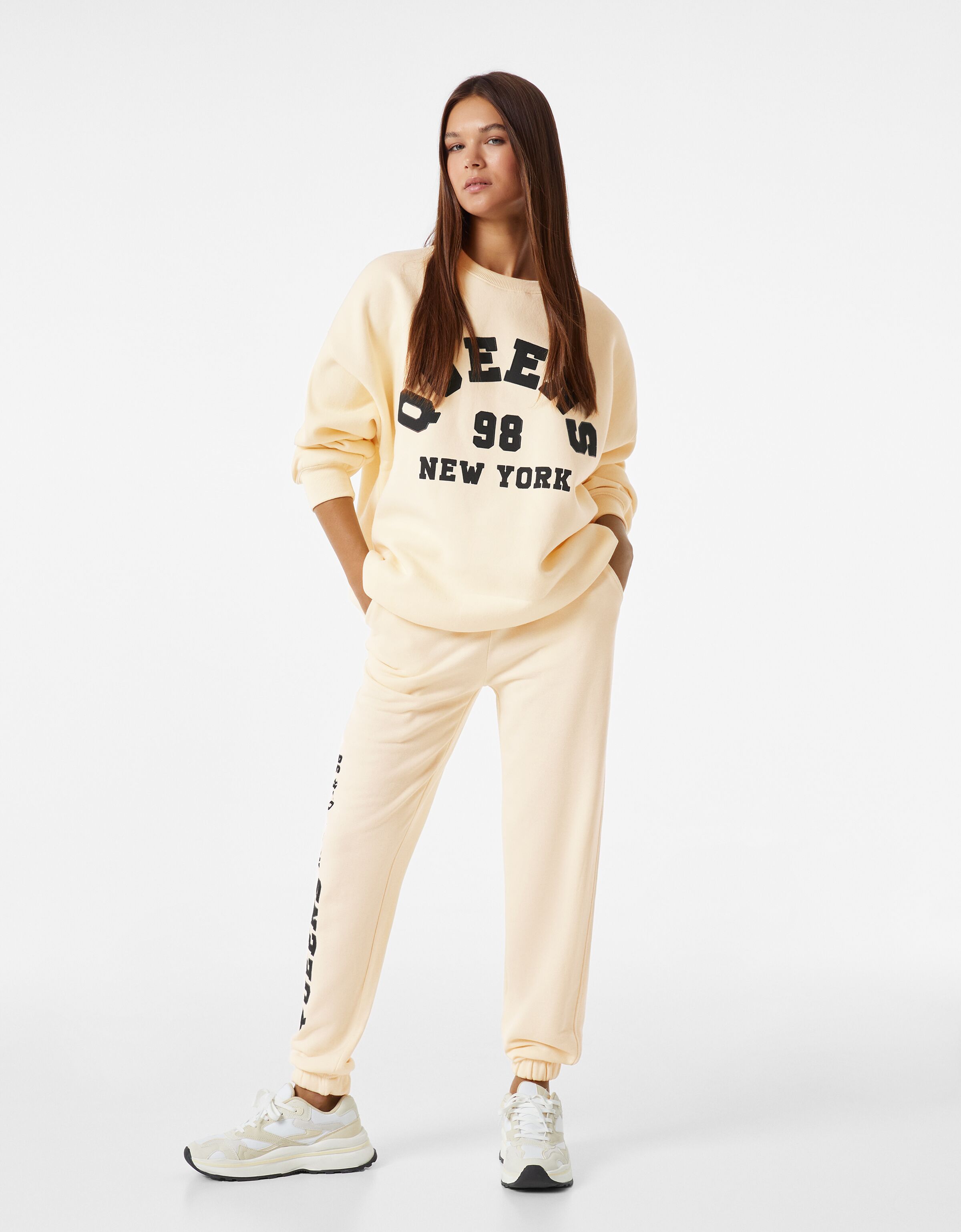 applying stomp pad snowboard