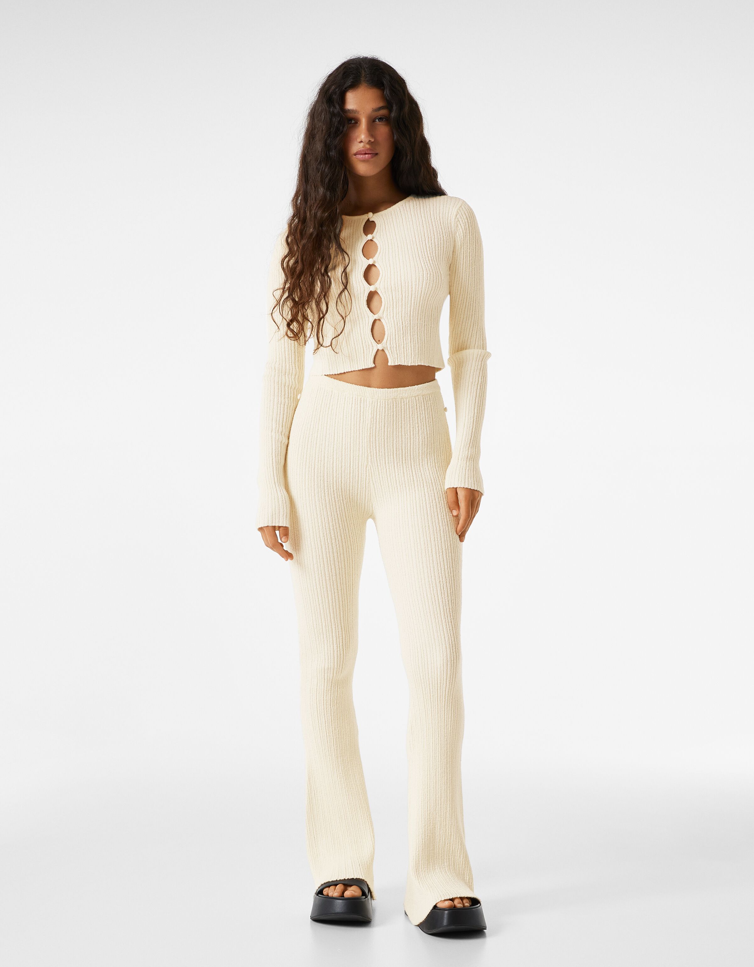 Rustic knit trousers and sweater set 