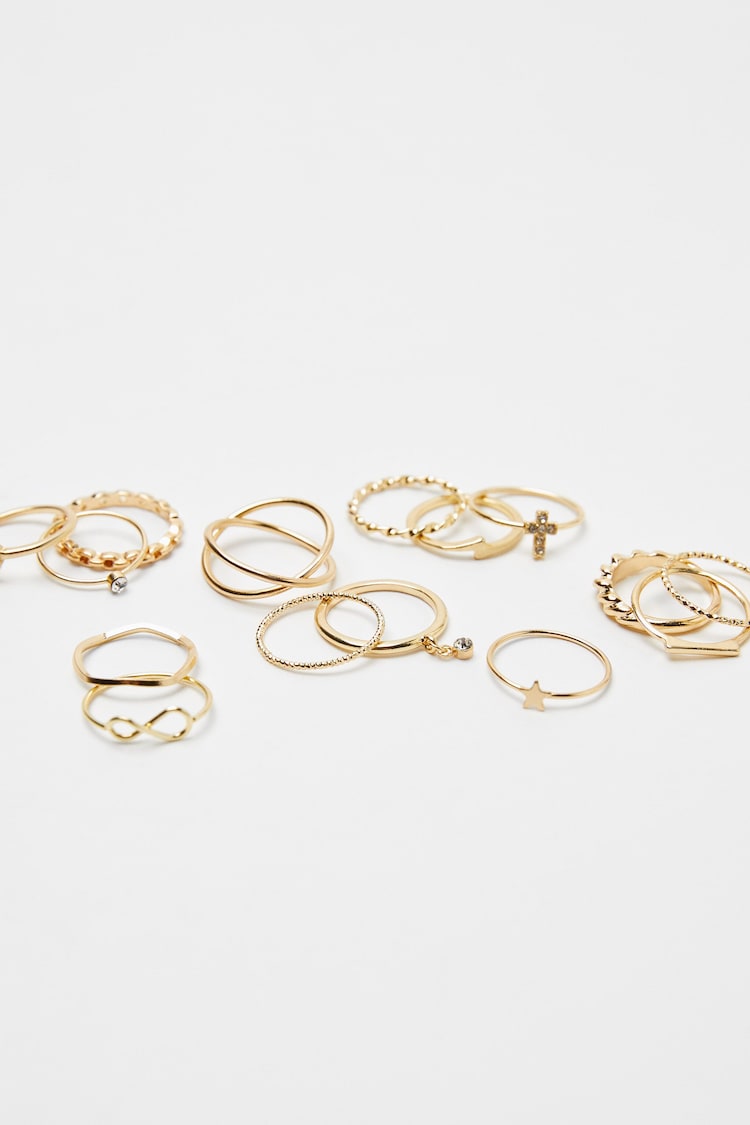 Set of 15 gold-effect cross rings