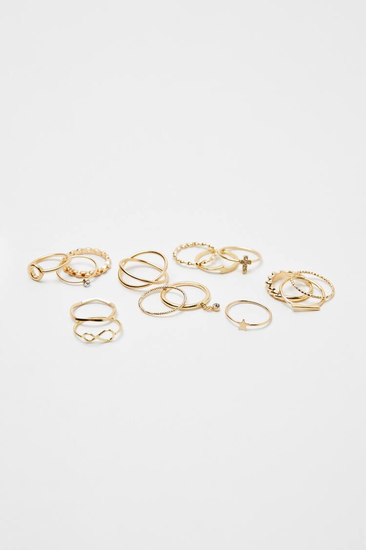 Set of 15 gold-effect cross rings
