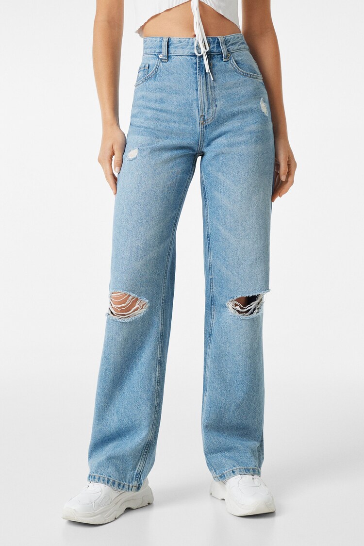 Plačiaklešniai 90-ųjų stiliaus džinsai su įplėšimais