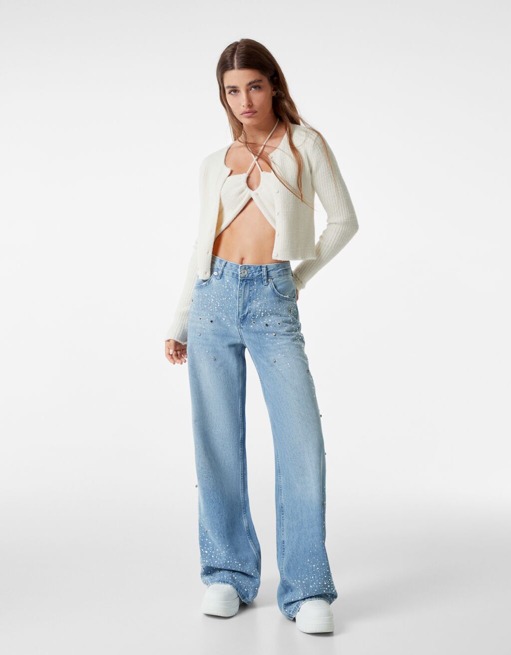 Low waist wide-leg jeans with rhinestones - Woman | Bershka