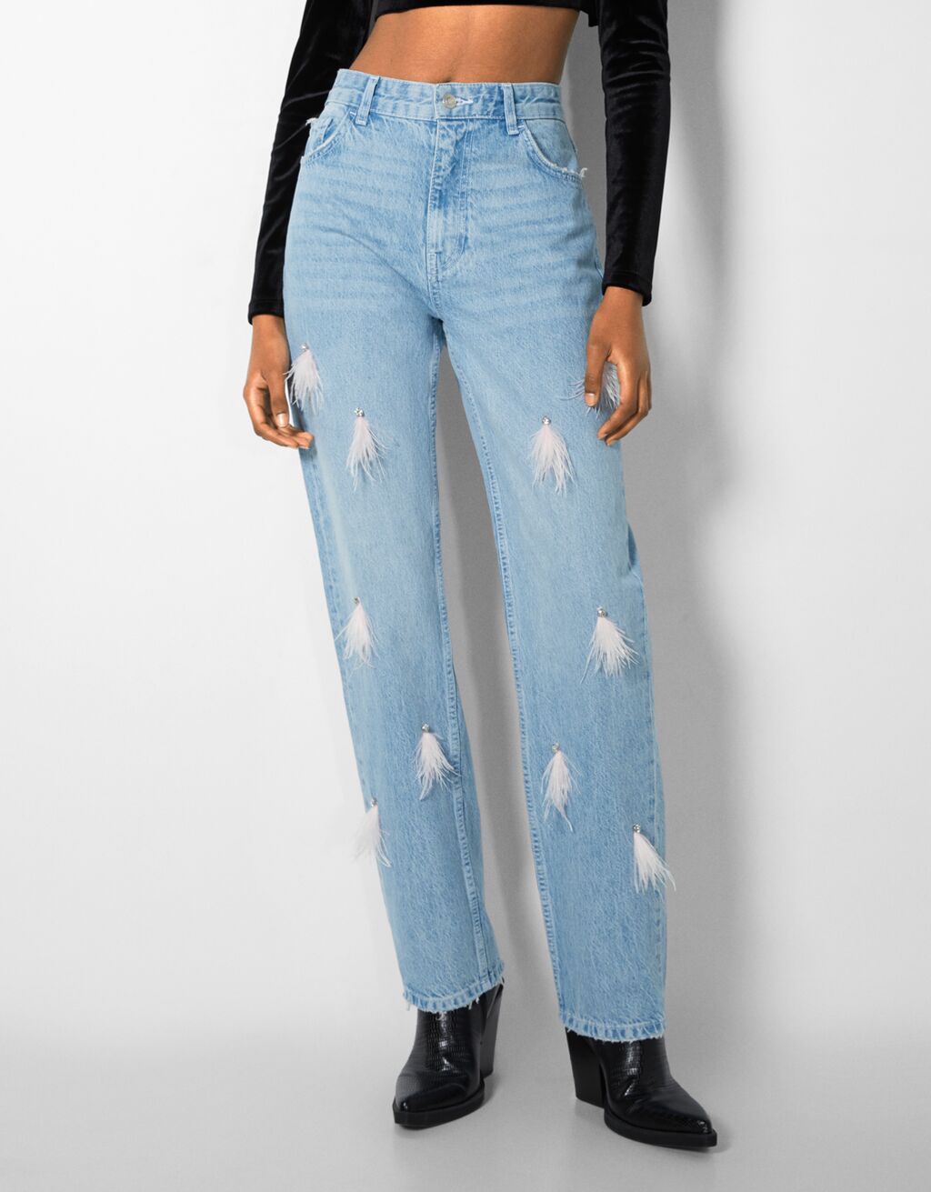 Recht model jeans met veren en stras