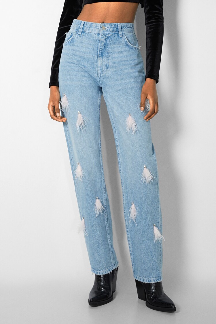 Straight fit jeans with feathers and rhinestones