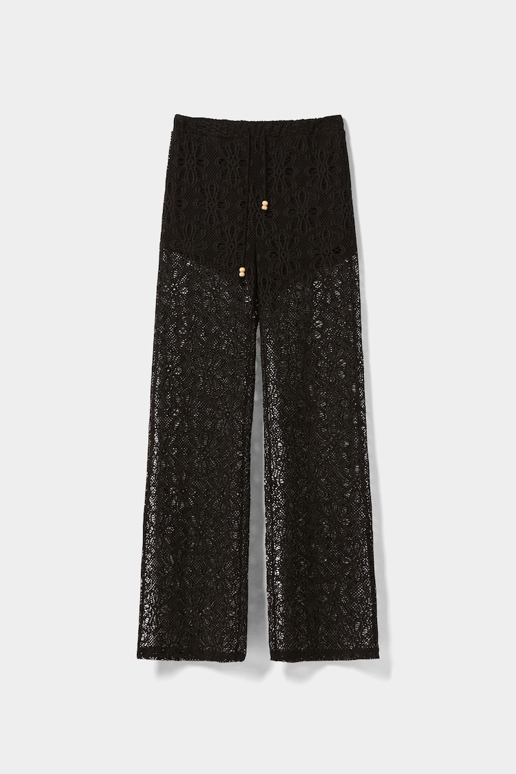 Wide-leg daisy pattern crochet trousers