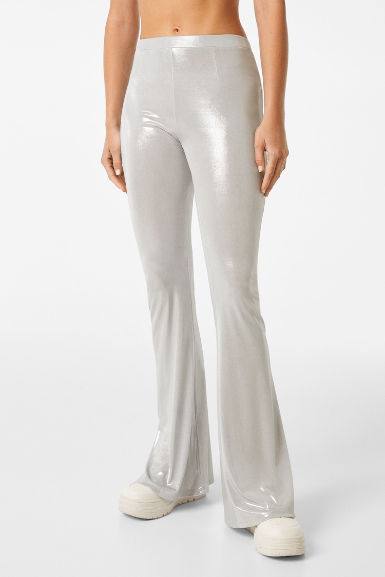 Flared silver foil trousers