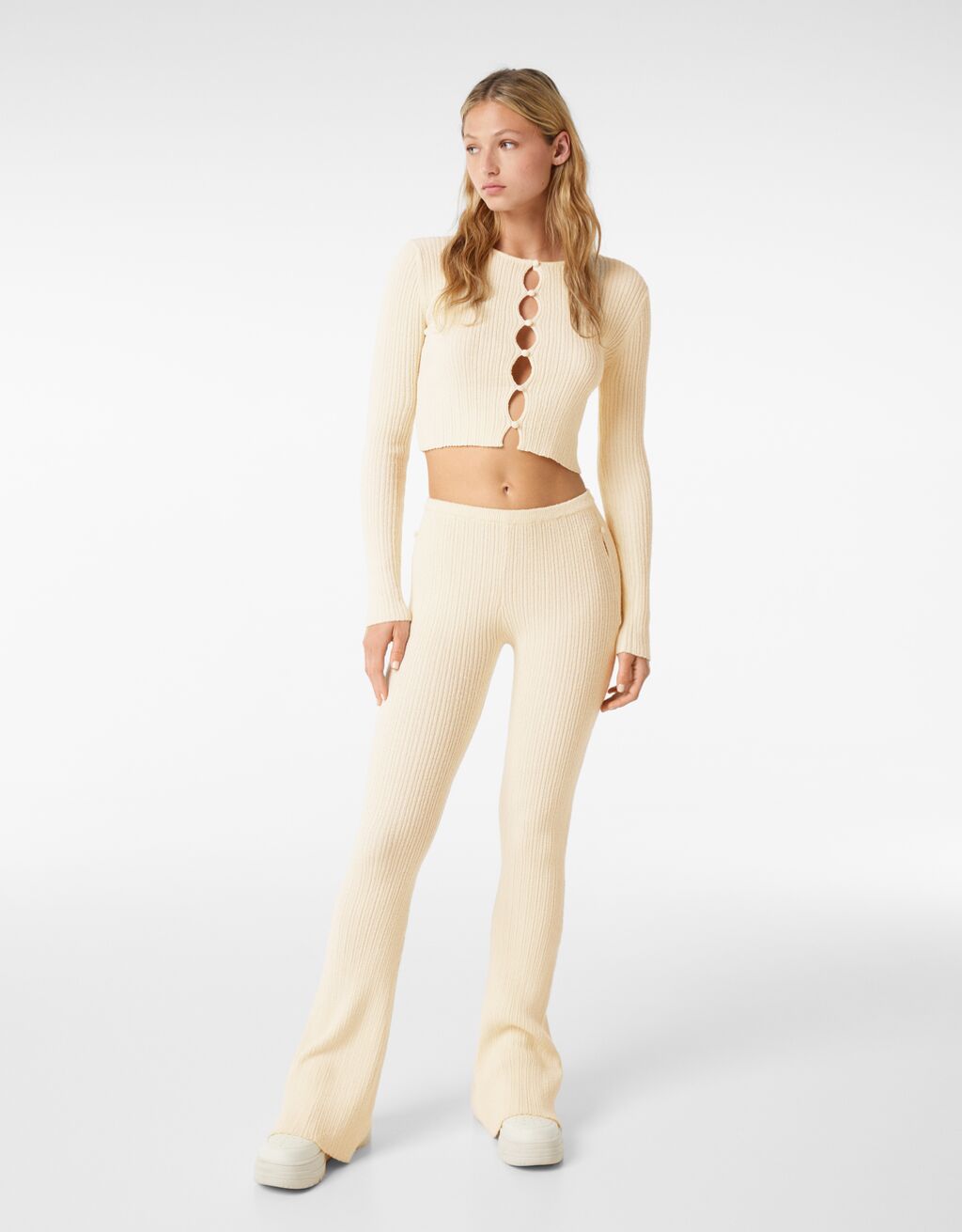 Rustic knit bell bottom trousers