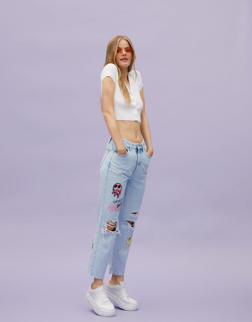 Straight fit jeans with patches and print