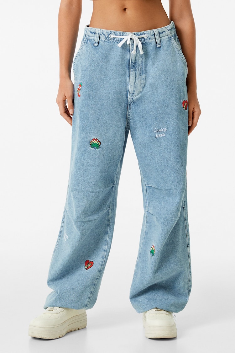 Embroidered parachute jeans