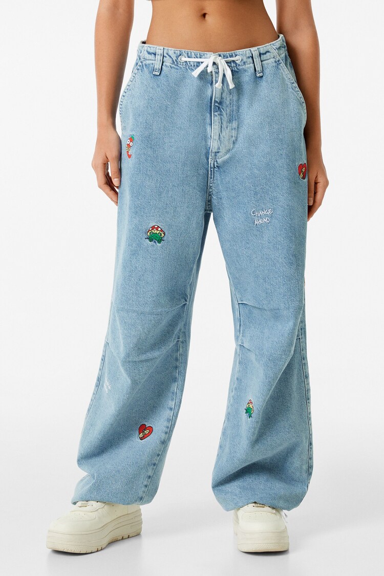 Široke džins hlače z vezenino