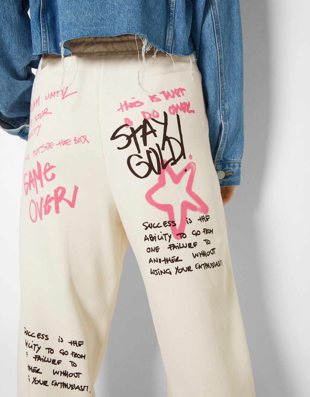white graffiti joggers