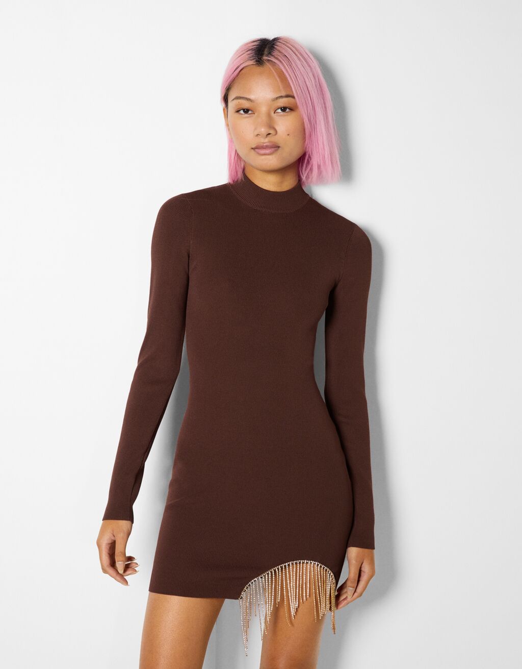 Knit mini dress with long sleeves and side detail Woman Bershka