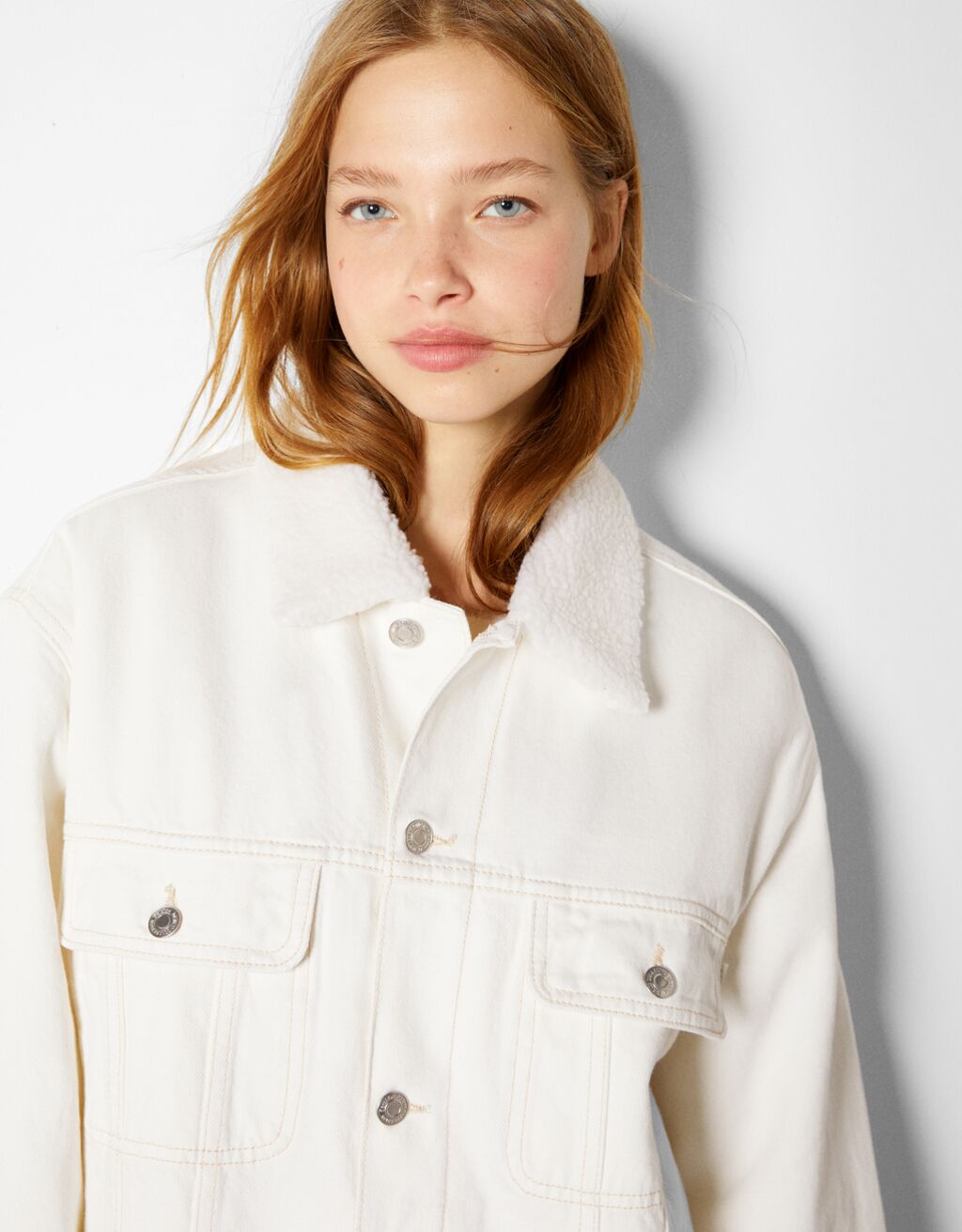 Denim bomber jacket with faux sheepskin Woman Bershka