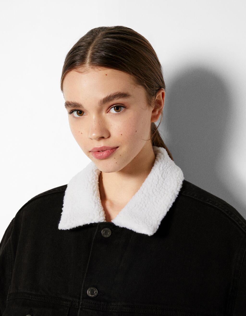 Denim bomber jacket with faux shearling Woman Bershka